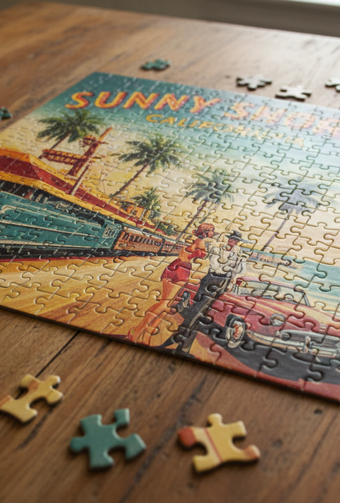 Vintage jigsaw puzzle with retro scenic design on a wooden table