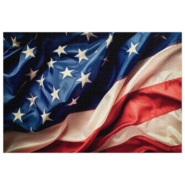 American Flag Jigsaw Puzzle in Tin featuring vivid stars and stripes with flowing fabric texture, available in multiple sizes.