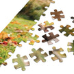 French Bulldog Family Autumn Jigsaw Puzzle in Tin pieces showcasing an autumn park scene with fallen leaves and vibrant colors.